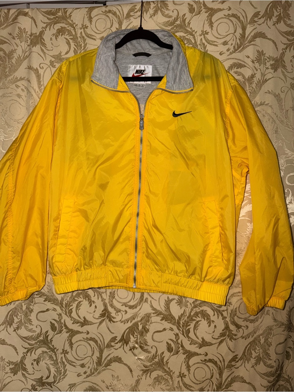 Nike Yellow Jacket with Red Swoosh Detail